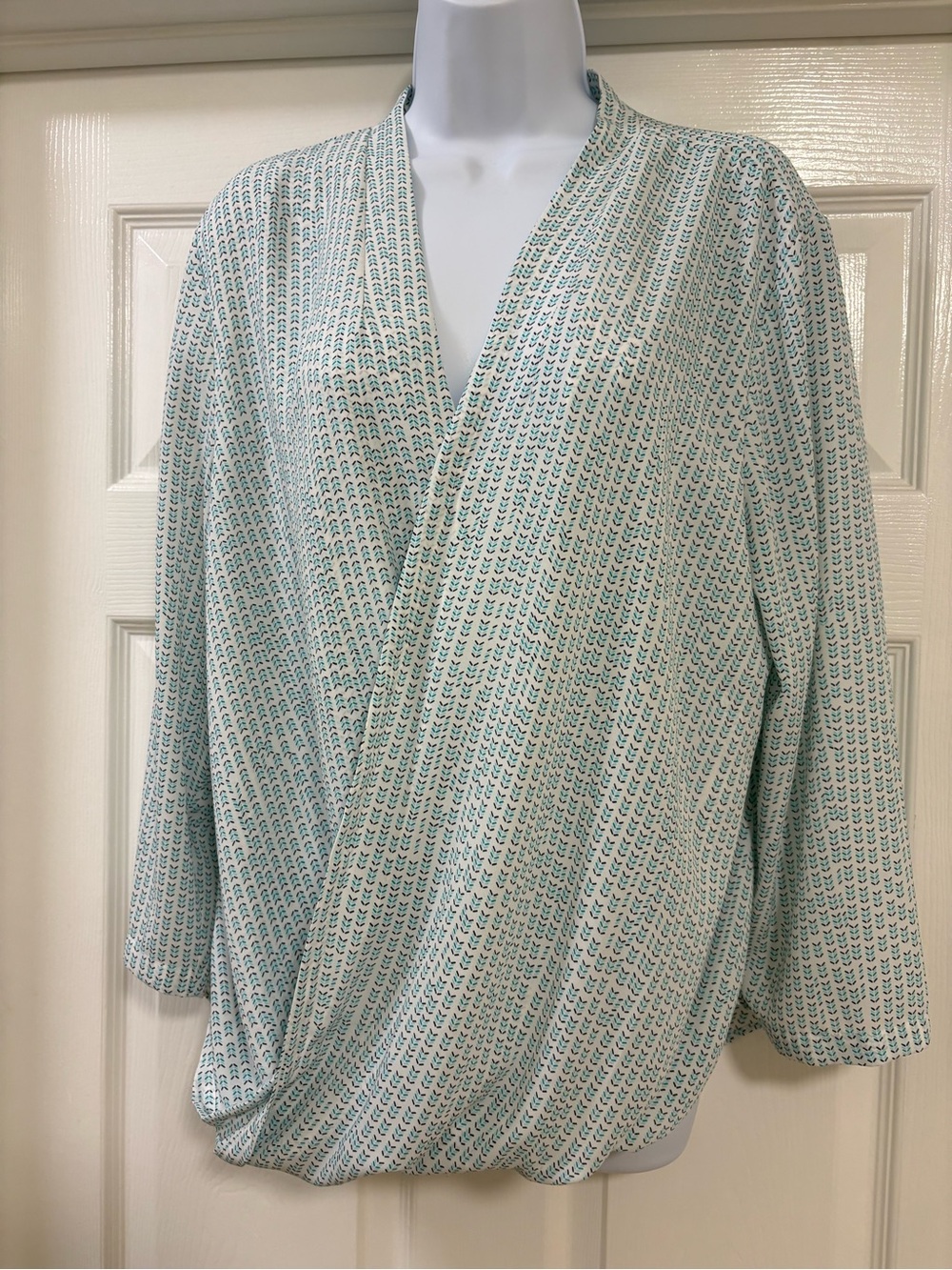 Loft lightweight, 3/4-sleeve blouse with a green and black chevron print